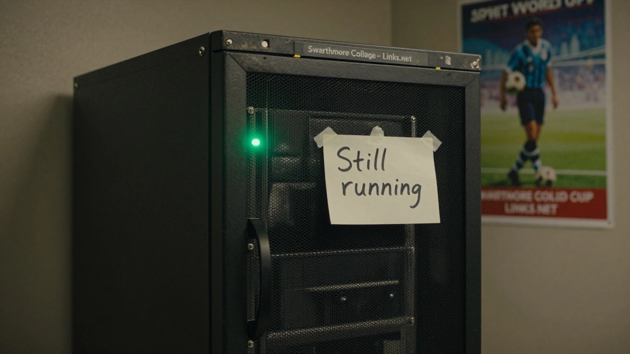An old university server rack with a single blinking light, labeled 'Links.net', in a quiet basement with a faded World Cup poster.